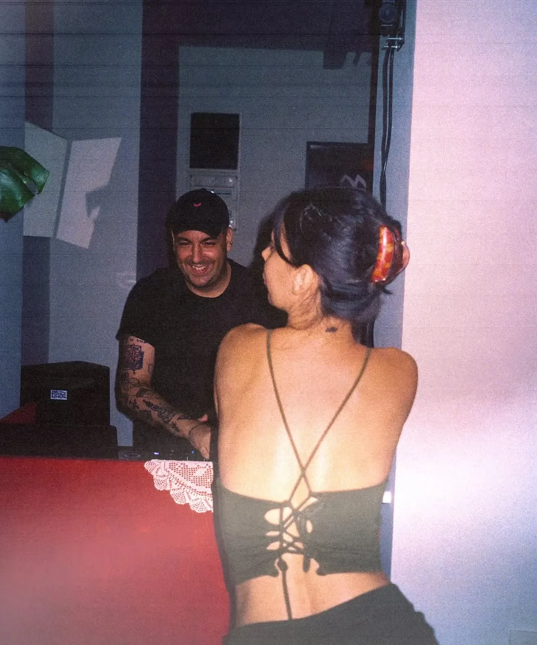 DJ and guest on the Komša dancefloor during a recent July night